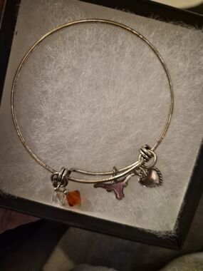 Silver Tone Women's Charm Bangle Bracelet with Orange Longhorn Charm